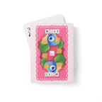 Colorful Playing Cards with "Chido" Mexican slang on a pink background. The Spanglish Society