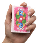 Colorful Playing Cards with "Chido" Mexican slang on a pink background. The Spanglish Society